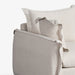 תמונה מזווית מספר 2 של המוצר DALAS | כורסא מפנקת מרופדת בבד פשתן רך ובעיצוב מודרני