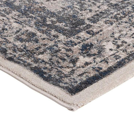 מעבר לעמוד מוצר KIRAN | שטיח מעוצב בגווני בז' ואפור עם נגיעות של כחול