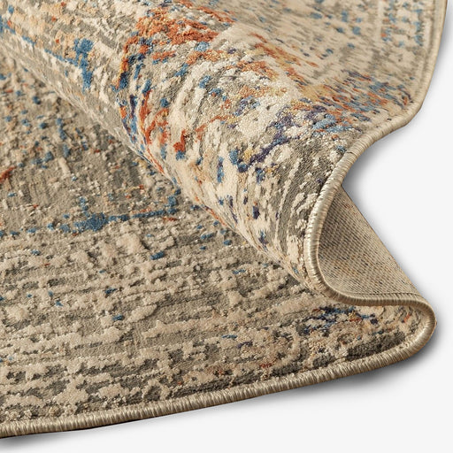 מעבר לעמוד מוצר SORAY | שטיח אתני עגול בגוונים של בז' וכחול