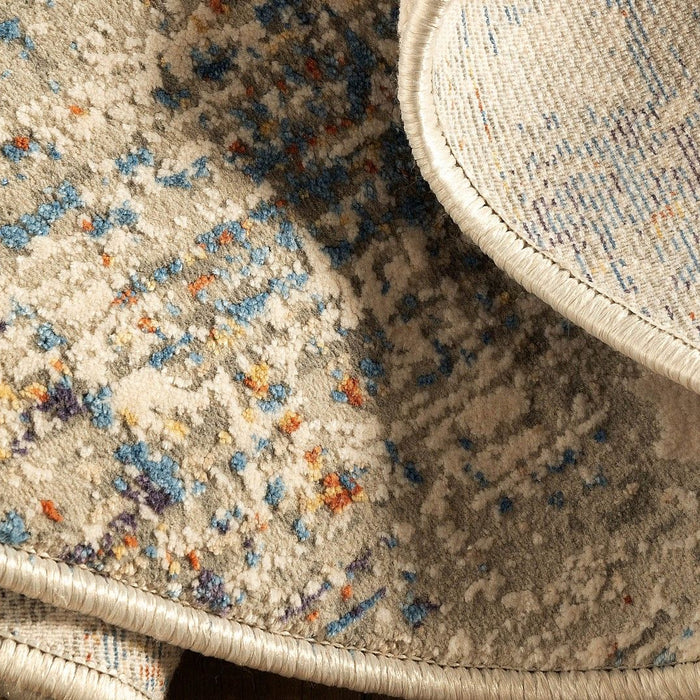 DHARMI | שטיח עגול בעיצוב מופשט בגוונים של בז' וכחול