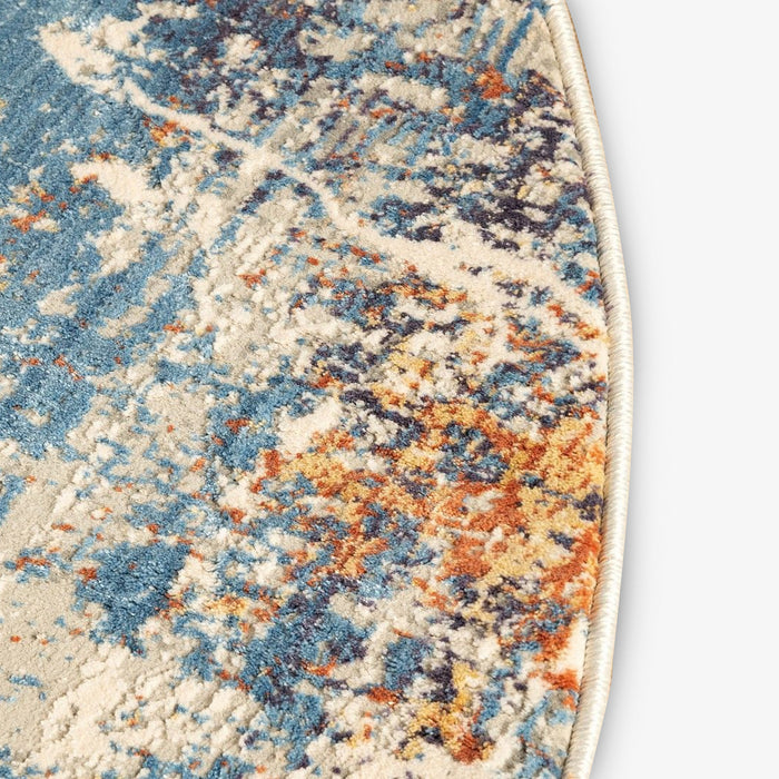 DHARMI | שטיח עגול בעיצוב מופשט בגוונים של בז' וכחול
