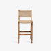 תמונה מזווית מספר 2 של המוצר MARIUERLA BAR STOOL | כיסא בר מעץ טיק מלא בשילוב ראטן בגוון בהיר