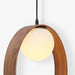תמונה מזווית מספר 3 של המוצר SHIRI | מנורת תליה עגולה בגוון עץ כהה